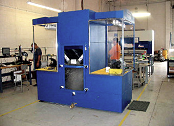 Wet collector downdraft table collects titanium dust.