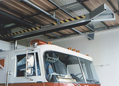Automatic rail system for vertical stack exhaust removal.