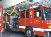 Sliding balancer moves with fire truck through the bay.